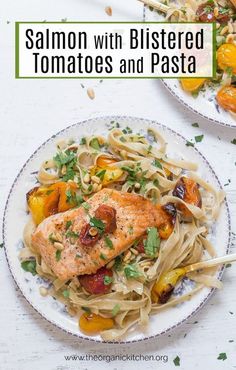 salmon with roasted tomatoes and pasta on a plate