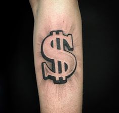 a man's arm with a dollar tattoo on it