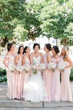 a group of women standing next to each other