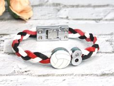 Show your love for volleyball with braided leather bracelet. Customize it with your jersey number, team's colors or simply your favorite colors! This bracelet is made of faux leather strap with metal buckle  as closure. About 8mm in width. Length is customized.  This sports bracelet is carefully and beautifully handcrafted to give an accent to your sporty look. Using durable and high quality materials, this bracelet is meant to charm and last with proper care.  Lots of colors to choose from, you Printable Ruler, Volleyball Jewelry, Fan Bracelet, Team Bracelets, Sports Bracelet, Volleyball Team, Braided Leather Bracelet, Volley Ball, Sporty Look