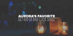 two jars with candles sitting on top of them next to each other and the words aurora's favorite get rid of bad luck spell