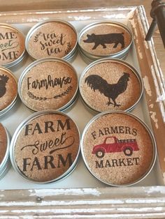 a box filled with lots of magnets covered in different types of farm related items