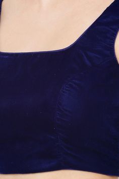 Product Features:   Color: Royal Blue Fabric: Velvet Pattern: Solid Sleeve: Sleeveless Neck Type: Round Neck Package Content: 1 Blouse Product Weight: 500 Gram Fabric Care: First wash dry clean only Disclaimer: There will be slight difference in Digital to actual Image Sleeveless Padded Blue Blouse, Sleeveless Padded Blouse In Blue, Blue Sleeveless Padded Blouse, Velvet Blouse Design, Royal Blue Fabric, Velvet Pattern, Royal Blue Blouse, Velvet Blouse, Velvet Blouses