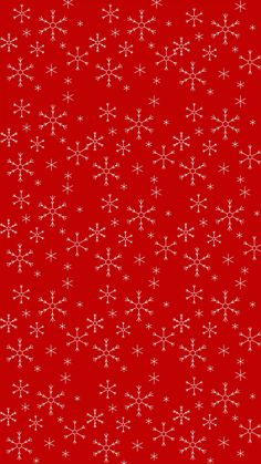 a red background with white snowflakes on it