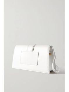 JACQUEMUS Le Bambino Long leather shoulder bag | NET-A-PORTER Designer White Baguette Bag, Designer White Rectangular Flap Bag, Designer White Baguette Bag With Top Handle, Designer White Top Handle Baguette Bag, Luxury White Clutch Shoulder Bag, Designer White Box Bag With Dust Bag, Luxury White Satchel Flap Bag, White Luxury Satchel Flap Bag, Luxury White Flap Bag With Removable Pouch