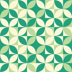 a green and white pattern with circles