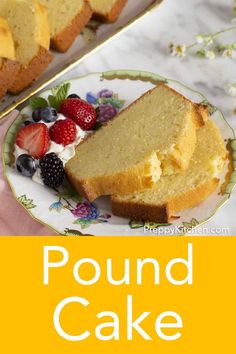 pound cake on a plate with berries and whipped cream in the middle next to it