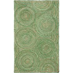 a green rug with circles on it