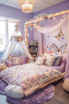 a bedroom decorated in purple and white with butterflies on the ceiling, bedding, pillows, and curtains