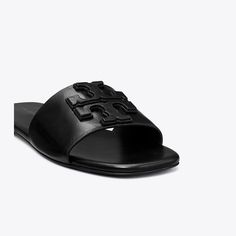 Chic and minimal, the Ines Slide is crafted in soft leather with a comfortable cushioned footbed. A double-stacked leather logo adds subtle dimension to the effortless and elevated sandal. Nice Sandals, Miller Sandal, Brown Leather Sandals, Jelly Sandals, Footwear Design Women, Leather Slides, Designer Sandals, Leather Logo, Black Flats