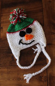 Snowman hat can be made in any colors. If you choose, the custom color option, please leave your color choices in the 'note to seller' section at checkout.  If you are unsure what size to order feel free to include the circumference of the head and I can make the hat the exact size you need.  Colors may vary slightly due to different computer screens. This item is made to order and turnaround time is 1-2 weeks plus shipping time, if you need your item(s) sooner, please convo us prior to placing Snowman Hat Crochet, Snow Man Hat, Crochet Snowman Hat, Santa Scarf, Crochet Hat Winter, Hat Snow, Crochet Snowman, Snowman Hat, Christmas Scarf