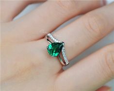 7*9 mm pear cut Emerald ring, made with 925 sterling silver, plated with white gold, beautiful as promise ring, anniversary gift.Main Stone: 7*9 mm simulated emerald/ lab created Emerald Side Stone: CZCS0121Custom order accepted, if need different stone or material, just feel free to contact us.:)Home page: https://www.etsy.com/shop/CarrieStudio?ref=seller-platform-mcnav Silver Teardrop Emerald Ring For Wedding, Silver Teardrop Emerald Wedding Ring, Skull References, Silver Diamond Jewelry, Ladies Ring, Ring Emerald, Ring Ideas, Emerald Engagement, Emerald Engagement Ring