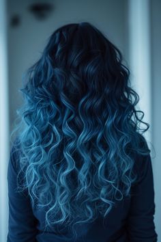 Long curly hair with a midnight blue ombre is a trending look for 2024. The deep and mysterious blue adds a dramatic and enchanting touch to the curls, perfect for a bold and stylish statement. Blue Balayage Curly Hair, Blue Balayage Hair Brunettes, Blue Balayage Hair, Dream Hairstyles, Long Sleek Hair, Blue Ombre Hair, Light Blue Hair, 2024 Wishlist