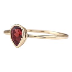 Stamped: 14K Yellow Gold Total Ring Weight: 1.1 Grams Ring Length: N/ARing Width: N/A Gemstone Weight: Total Natural Garnet Weight is 0.50 Carat Color: Red Face Measures: 7.10x5.05 mm Sku: [703378W] Pear-shaped 14k Yellow Gold Birthstone Ring, 14k Yellow Gold Pear-shaped Birthstone Ring, Pear-shaped Yellow Gold Birthstone Ring, Red Gemstone Stackable Rings For Formal Occasions, Formal Red Stackable Gemstone Rings, Formal Red Stackable Rings In Fine Jewelry Style, Formal Red Stackable Rings Fine Jewelry, Red Stackable Rings For Formal Occasions, Classic Pear-shaped Red Rings