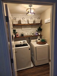 a washer and dryer in a small room