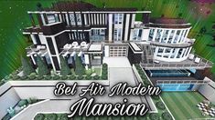 a large modern mansion with lots of windows