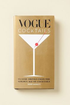 the book cover is brown and has a martini glass on it's front side