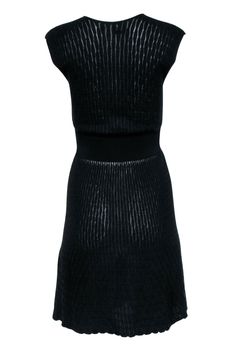 The iconic little black dress gets a fall makeover with this knit Missoni dress. Crafted form a luxe wool blend, this knit fit and flare dress features a ribbed kit mid section to show off your figure! Pair this with a tall leather boot heel and statement earrings for a date night winter look! Size 4 58% Merino Wool, 42% Viscose Unlined Sleeveless V-neckline Pullover Bust 25" Waist 19.5" Shoulder to hem 38" Date Night Winter, Missoni Dress, Leather Boots Heels, Cap Sleeve Dress, M Missoni, Tall Leather Boots, Leather Boot, Capped Sleeve Dress, Winter Looks