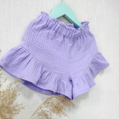 Cotton Ruffled Bloomers For Playwear, Cute Ruffled Bloomers For Beach, Cute Beach Bloomers With Ruffles, Cute Summer Playwear Shorts, Cute Summer Bloomers With Ruffles, Cotton Ruffled Short Bloomers, Summer Cotton Ruffle Shorts, Summer Cotton Shorts With Ruffles, Ruffled Cotton Shorts For Summer