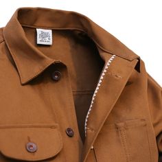 The Railcar Chore Coat is a perfect year round garment. This new Fall 2019 release is richer in color then it's predecessor. While being in the same color shade, the new 12 ounce fabric has more color saturation. The coats are cut and sewn in the Railcar workshop in California out of a tough and breathable 12 ounce duc Gabardine Pea Coat With Pockets, Long Sleeve Gabardine Pea Coat With Pockets, Fall Workwear Utility Jacket With Double-needle Stitching, Fall Utility Jacket With Double-needle Stitching For Workwear, Camp Collar Outerwear With Buttons For Work, Felled Seam, Flat Felled Seam, Americana Style, Classic Americana