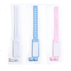 three different types of toothbrushes are shown in this image, one is pink, the other is blue