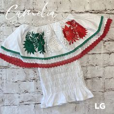 Perfect for Cinco de Mayo or Mexican Independence Day Celebration. Our Off Shoulder Viva Mexico blouse is comfortable and made of 100% Cotton with Silk Frontal embroidery . The all around elastic waist will give you a perfect fit. Ruffle has a tricolor lattice detailed lace all around and measures between 9-10 inches depending on size. Pair it up with one of our hand made necklaces and hand made gauze skirts. SHOP all of our VIVA MEXICO COLLECTION HERE SIZE WIDTH (underarm to underarm) BUST LENG Casual White Top For Cinco De Mayo, Mexican Independence Day, Mexican Independence, Independence Day Celebration, Gauze Skirts, Mexican Blouse, Blouse Sale, Angel Sleeve, Large White