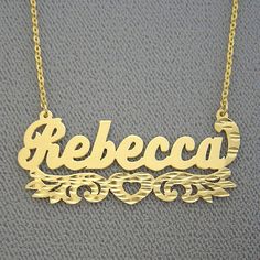 "*Average Name Pendant Width : 1 3/4 Inch (4.5 cm) Approx. *Up to 9 Letters. *Pendant Thickness : 0.5 mm / 25 Gauge / 0.020\" *Premium high end quality personalized laser cut out any letters/numbers in 10kt or 14kt solid yellow or white gold personalized name necklace, this item comes with split sturdy 1.25 mm Flat Rollo chain from 15~20 inches, name pendant length not included on length option. *This pendant cut out by latest technology laser machine, top quality guaranteed. *All personalized j Gold Double Heart Name Necklace, Personalized Gold Double Heart Name Necklace, Personalized Gold Name Necklace With Double Heart, Engraved 14k Gold Double Heart Jewelry, Gold Nameplate Heart Necklace, Gold Heart Nameplate Necklace, Gold Double Heart Name Necklace For Personalized Gift, Gold Double Heart Name Necklace As Personalized Gift, Gold Double Heart Name Necklace For Mother's Day