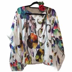 Nwt Poncho-Cape-Shaw Popover. Sharkbite Hem. Top Multi Colored Floral Fantasy By Drsign Artist Series Series. Lagenlook. Vibrant Artistic Ponch Shaw Has Fringed Edges. White Purple Green Blue Orange Yellow Navy Red Lavender. Approximate Measurements 25 Inches Long. 42 Inches Wide. Perfect For Spring. Colorful. Nwt Xmas Gift For Mom Mom Gift Xmas Artist Gift Artsy Boho Hippie Psychedelic Multi Colors Fringe Floral Cpm. 2.9 Oz.Owl Xmas Gift, Holiday Party, New Years White Summer Poncho Shawl, One Size Multicolor Floral Print Tops, Multicolor Poncho For Spring, One Size, Multicolor One-size Poncho For Spring, Multicolor One Size Poncho For Spring, White Batwing Sleeve Poncho For Summer, White Bohemian Poncho For Spring, White Long Sleeve Summer Poncho, White Shawl Poncho For Spring