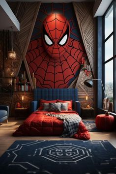 a bedroom with a spider man head on the wall