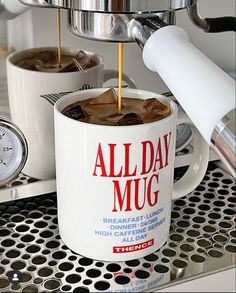 two cups of coffee being poured into each other with the words all day mug on them