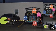 the back end of a car with pacman decorations on it