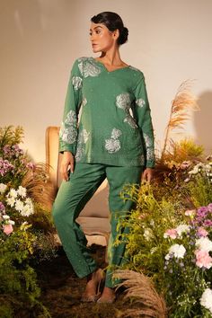 Green full sleeves top with rosa applique and Swarovski embellishments. Paired with a matching embroidered pant. - Aza Fashions Festive Hand Embellished Long Sleeve Sets, Spring Sequin Long Sleeve Set, Elegant Long Sleeve Embellished Pant Set, Embellished Fitted Pant Set With Long Sleeves, Festive Resham Embroidery Long Sleeve Pant Set, Fitted Embellished Long Sleeve Pant Set, Festive Long Sleeve Pant Set With Resham Embroidery, Fitted Long Sleeve Embellished Pant Set, Festive Embellished Long Sleeve Sets