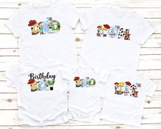 three white shirts with cartoon characters and the words birthday on them, sitting next to each other