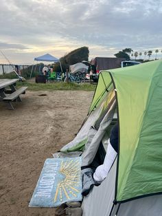 the tent is pitched up on the beach