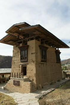 an old building made out of stone and wood