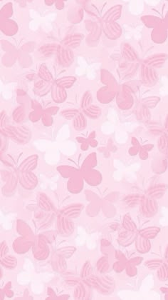 a pink background with many butterflies on it