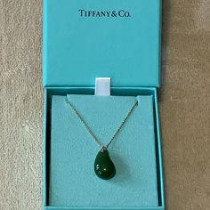 Rare Tiffany & Co. X Elsa Peretti Large Jade Teardrop Pendant 18k Necklace - In Excellent Vintage Condition - Jade Is A Stone Associated With Good Luck And Is Said To Ward Off Negative Energy! - Specks Are Part Of The Natural Green Jade - 18k Yellow Gold; Approximately 16.5 Inches With Clasp (See Photos) - Jade Pendant Is Approximately 1 1/4 Inch Long - Marked "Tiffany & Co." "Peretti" And "750" - Comes With Signature Blue Tiffany & Co. Jewelry Box (As Shown) - See Detailed Photos For More Infor Fine Jewelry Green Pear-shaped Necklaces, Jade Teardrop Pendant Jewelry Gift, Luxury Green Pear-shaped Necklace, Tiffany Atlas Necklace, Tiffany Elsa Peretti Necklace, Elsa Peretti, Jade Pendant, Jade Green, Tiffany & Co.