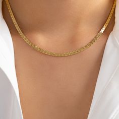 Material: gold plated brass Length: 15" + 2" extension IMPORTED Gold Snake Chain Choker With Clavicle Detail, Gold Plated Clavicle Snake Chain Necklace, Gold Snake Chain Necklace With Clavicle Chain, Gold Plated Tarnish Resistant Snake Chain Necklace, Gold-plated Tarnish Resistant Snake Chain Necklace, Gold Snake Chain Choker Necklace, Gold-plated Tarnish-resistant Snake Chain Necklace, Adjustable Gold Figaro Chain Necklace, Chain Necklace