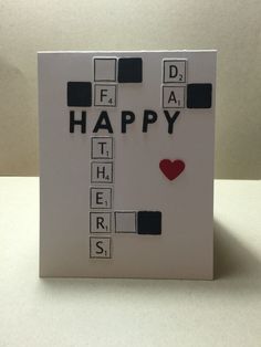 a happy father's day card with scrabbles