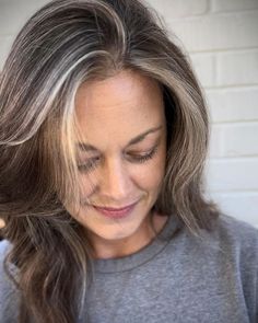 I love seeing how many women are embracing their gray hair and sharing their journeys on social media. As women, we tend to have unrealistic expectations for ourselves, in all areas of our lives, and this carries over into our hair. But, the fact is, pretty much all of us will go gray at some Going Grey Naturally With Dark Hair, Covering Gray Hair Light Brown, Grey Hair Growing Out From Brown, How To Let My Grey Hair Grow Out, Women’s Salt And Pepper Hair