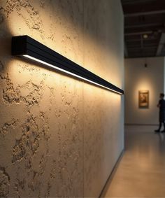 The 3.75-inch linear wall light comes with an extruded aluminum housing finished in a durable powder coat. Designed for continuous runs of up to 40 feet at 120V and 100 feet at 277V, the wall light features a regressed lens to reduce glare, delivering 450 to 900 lumens in full downlight mode and 500 to 1,000 lumens in a 50/50% uplight and downlight setting. The fixture includes a 7-position DIP switch for directional lighting, CCT adjustable settings (3000K, 3500K, 4000K), 0-10V dimming and optional emergency backup. Damp location rated for outdoor use under cover. Led Linear Lighting, Linear Wall Light, Frame Lighting, Profile Light, Bookshelf Lighting, Display Lighting, Lighting Wall Sconces, Directional Lighting, Home Contemporary