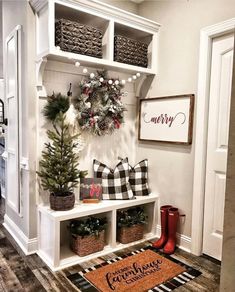 the entryway is decorated with christmas decorations and wreaths