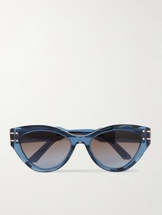 Dior Eyewear's 'B71' sunglasses have a cat-eye shape that the brand likens to butterfly wings. Made from see-through blue acetate, they have smoky gray lenses and are traced with gold-tone metal along the arms. Christian Dior Sunglasses, Blue Sunglasses, Dior Sunglasses, Eyewear Womens, Fine Watches, Eyewear Accessories, Eye Shapes, Grey Lenses, Pink Brown