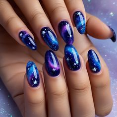 Travel to the stars with these stunning galaxy nails. A unique and creative design for any space lover. #Nails #NailDesign #NailIDes Diy Galaxy Nails Easy, Nail Designs Night Sky, Space Gel Nails, Red Galaxy Nails, Short Galaxy Nails, Purple Ombre Nails Short, Space Inspired Nails, Manifesting Nails, Space Nails Design