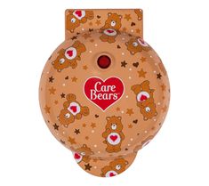 a brown teddy bear shaped box with the words care bears on it