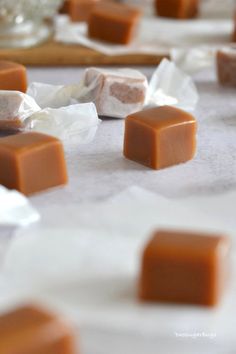 buttery and cheesy homemade caramels with text overlay that reads, buttery and cheemey homemade caramels