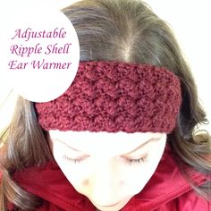 a woman wearing a red headband with the words adjustable apple shell ear warmer on it