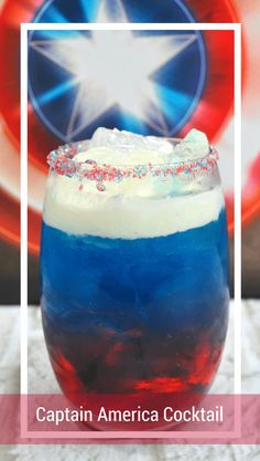 an american flag drink in a glass with sprinkles on the rim and red white and blue liquid