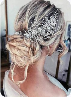 a woman wearing a bridal hair comb