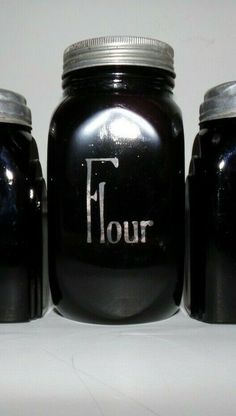 three jars with the word flour written on them